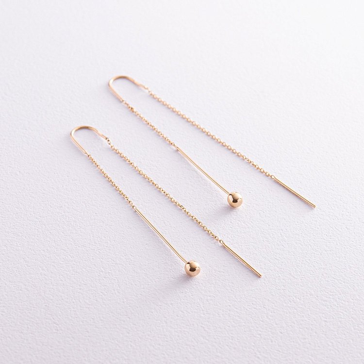 Сережки "Кульки" у жовтому золоті на ланцюжку с07984 від ювелірного магазину Онікс