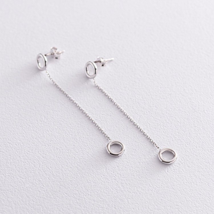 Серьги "Кружочки" на цепочке в белом золоте с07276 от ювелирного магазина Оникс