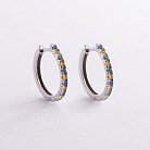Срібні сережки - кільця (блакитні та жовті камені) 698 от ювелирного магазина Оникс