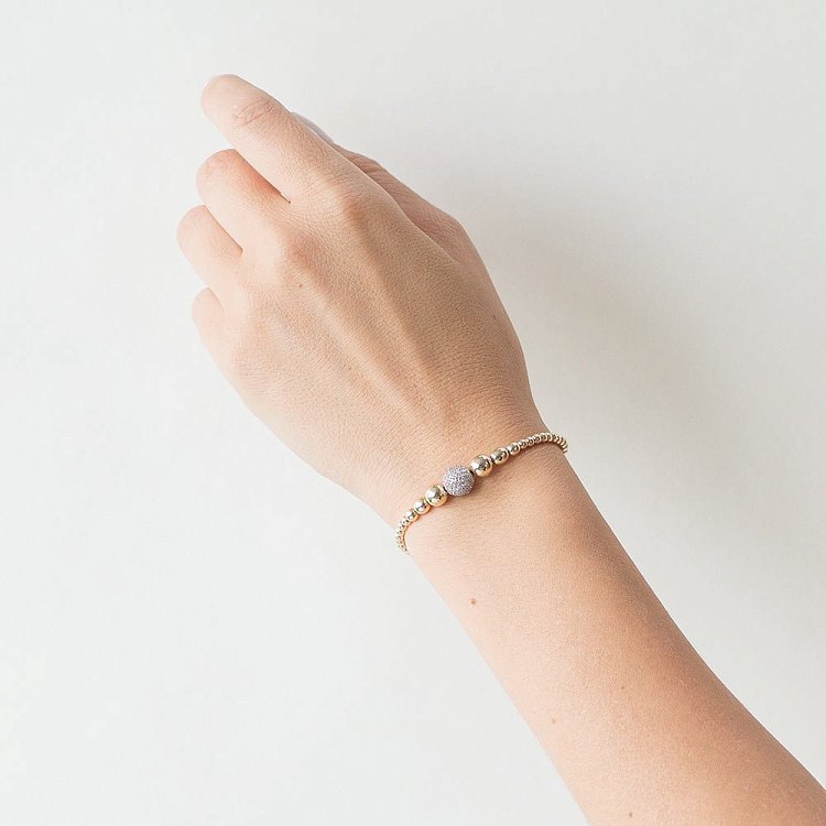 Золотий браслет "Кульки" з фіанітами б02690 від ювелірного магазину Онікс - 1