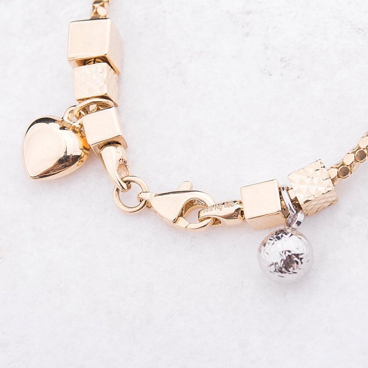 Ексклюзивний золотий браслет з серцями і кулею б02220 від ювелірного магазину Онікс - 2