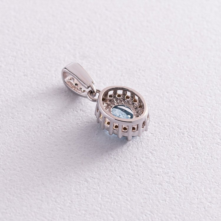 Золота підвіска з блакитним топазом і фіанітами п01335 від ювелірного магазину Онікс - 2