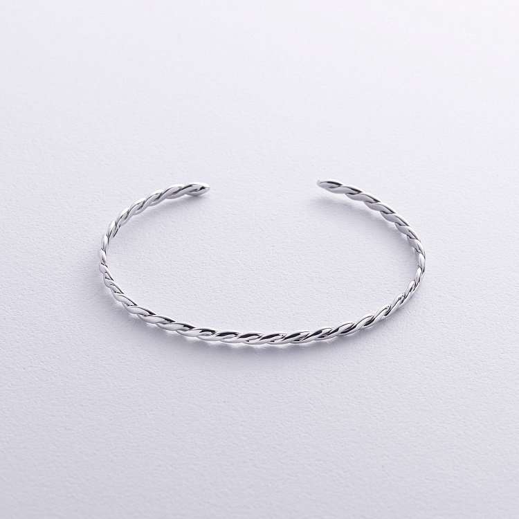 Жорсткий золотий браслет "Переплетення" б05369 від ювелірного магазину Онікс