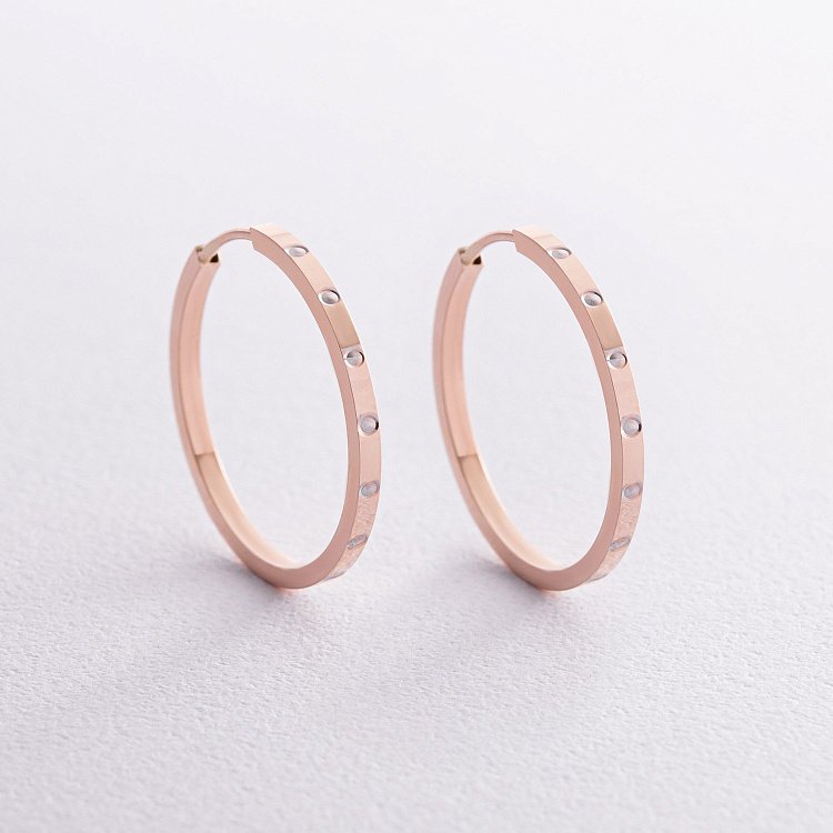 Сережки - кільця в червоному золоті с08285 від ювелірного магазину Онікс