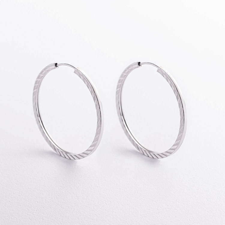 Сережки - кільця у сріблі 123521 від ювелірного магазину Онікс