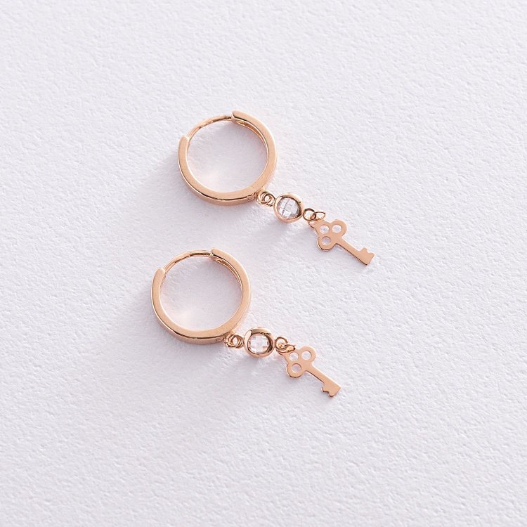 Золотые серьги "Ключики" с фианитами с07428 от ювелирного магазина Оникс