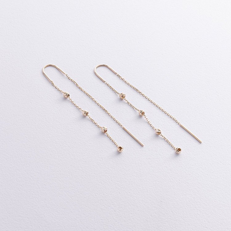 Серьги - протяжки с шариками (желтое золото) с09058 от ювелирного магазина Оникс