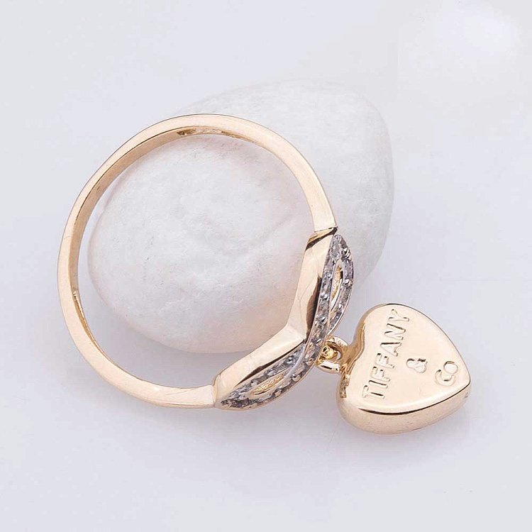 Золота каблучка "Нескінченність" з фіанітами к04601 від ювелірного магазину Онікс - 1