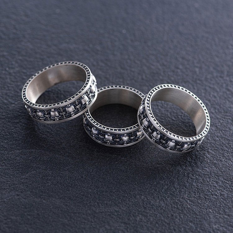 Мужское серебряное кольцо с черепами 1164 от ювелирного магазина Оникс - 2