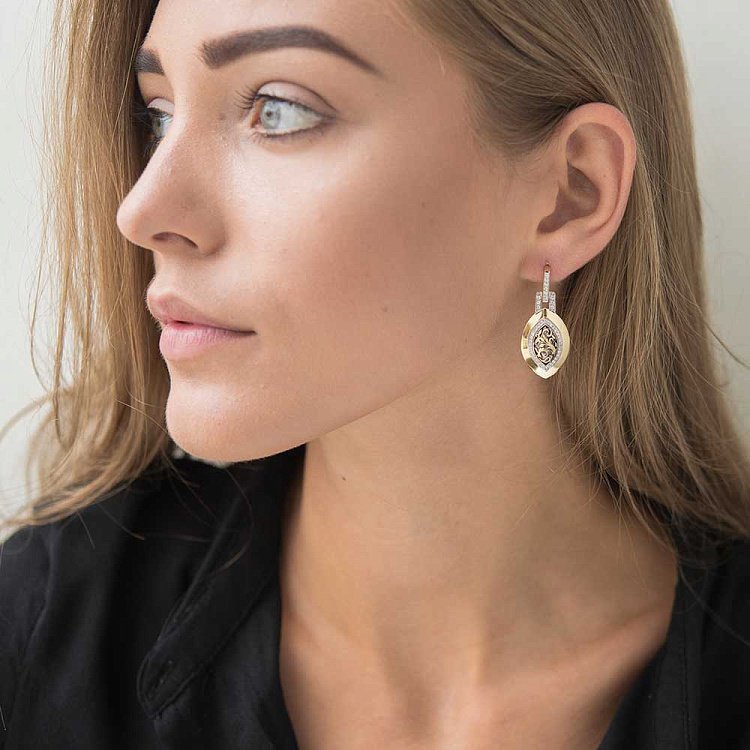 Золоті сережки з фіанітами с03725 від ювелірного магазину Онікс