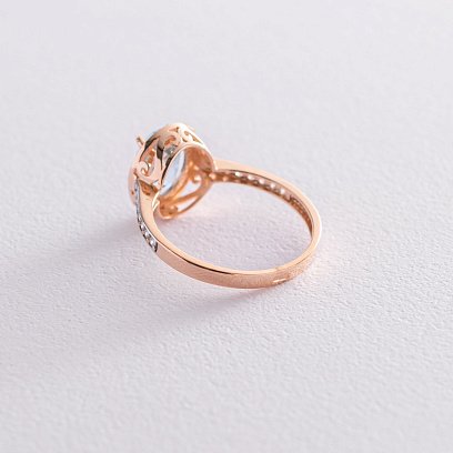 Золота каблучка з блакитним топазом і фіанітами к05664 №3