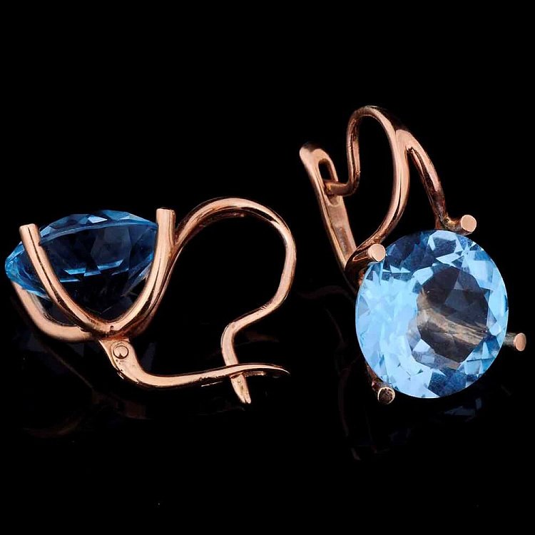 Золоті сережки з блакитним топазом с00911 від ювелірного магазину Онікс - 1