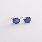 Золоті сережки-пусети з синіми сапфірами MM032259he от ювелирного магазина Оникс