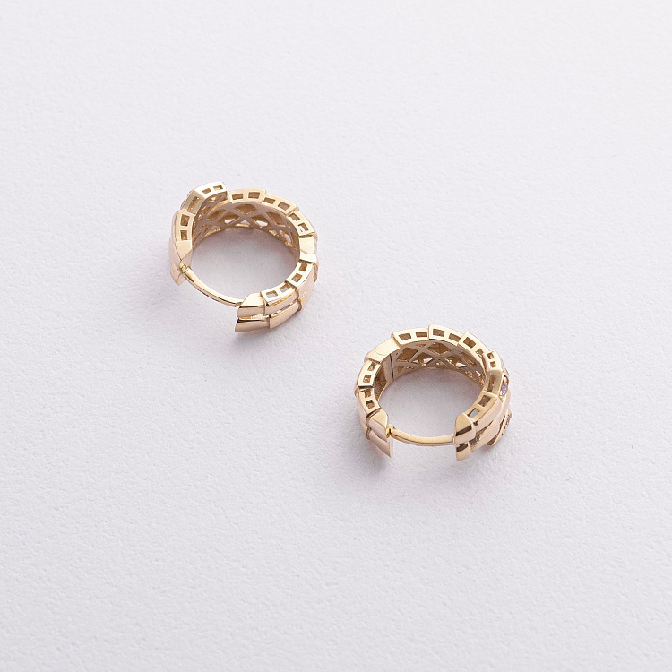 Серьги - кольца "Змеи" в желтом золоте (фианиты) с09378 от ювелирного магазина Оникс - 1