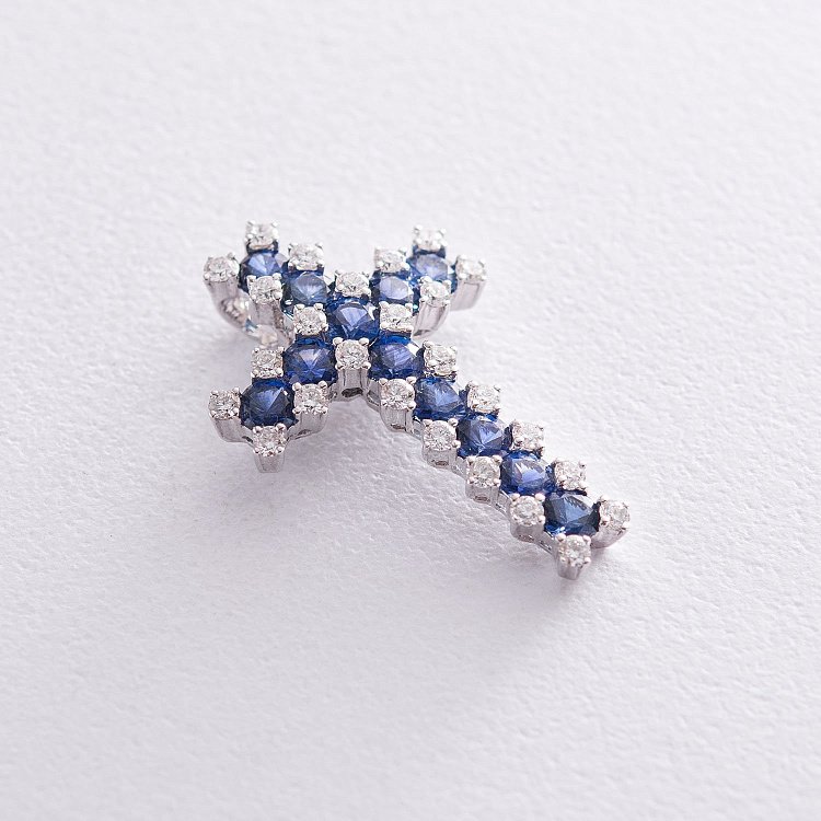 Золотой крестик (сапфиры, бриллианты) п545 от ювелирного магазина Оникс