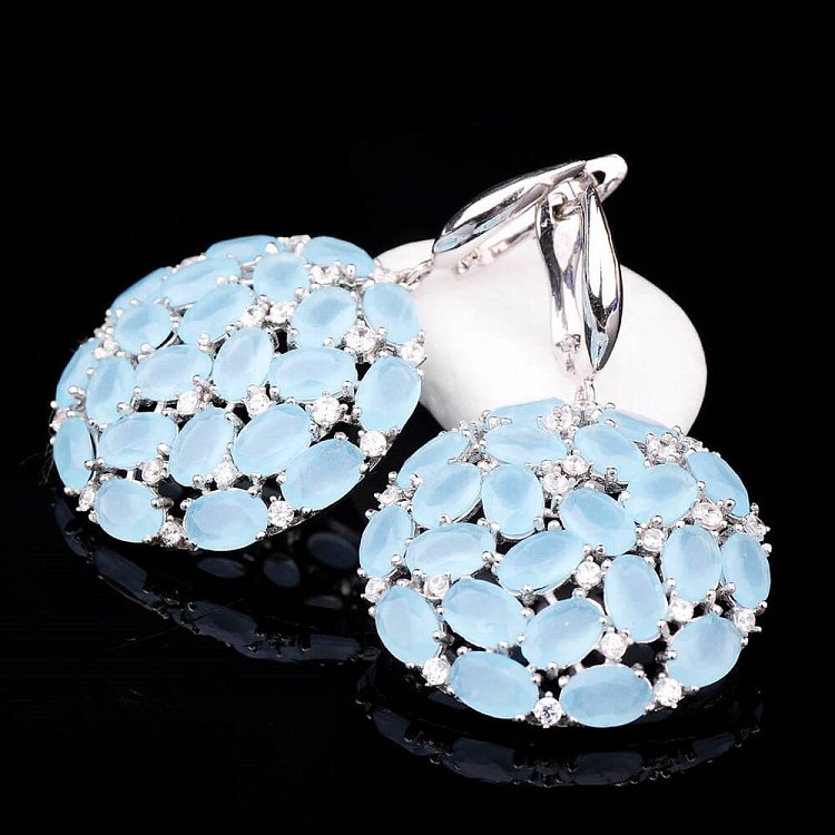 Круглі сережки зі срібла з фіанітами 121291 від ювелірного магазину Онікс