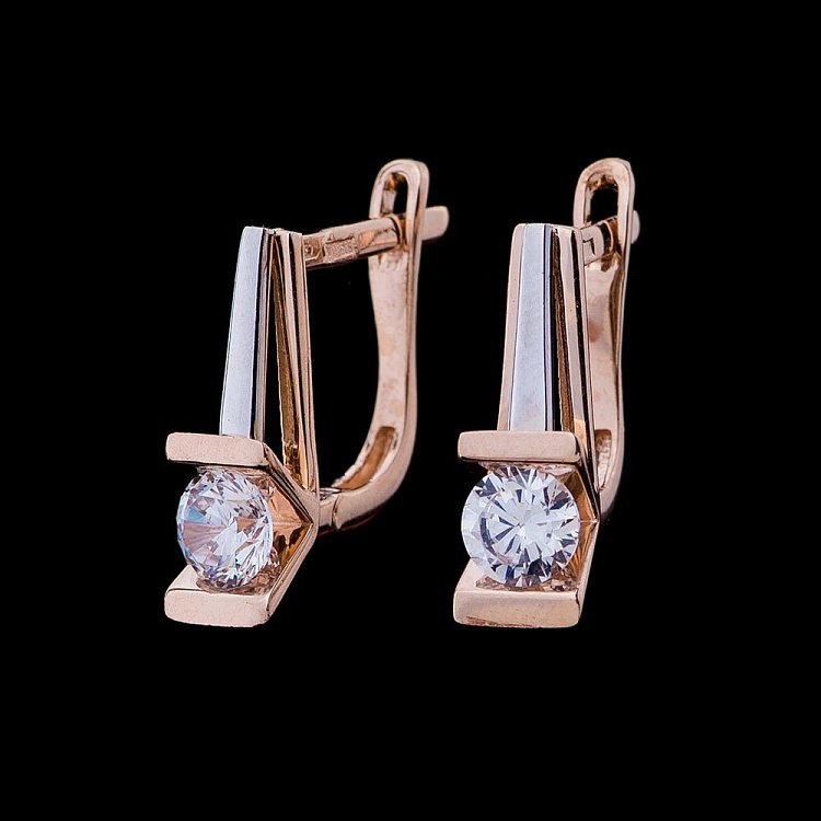 Золотые серьги с одним фианитом с04516 от ювелирного магазина Оникс