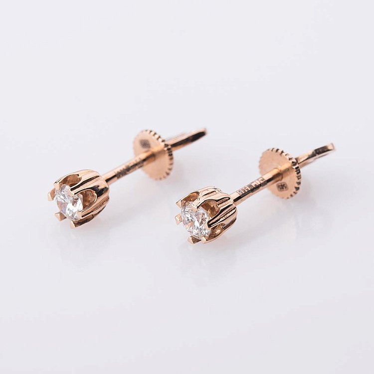 Золоті сережки-пусети з діамантами сб0009 від ювелірного магазину Онікс