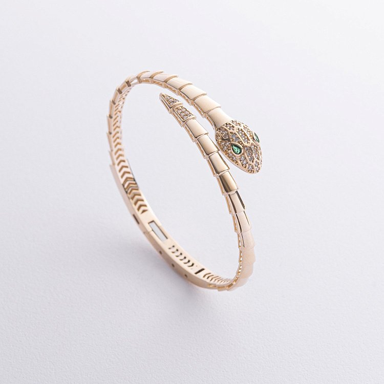 Жорсткий браслет "Змія" у жовтому золоті (фіаніти) б05513 від ювелірного магазину Онікс