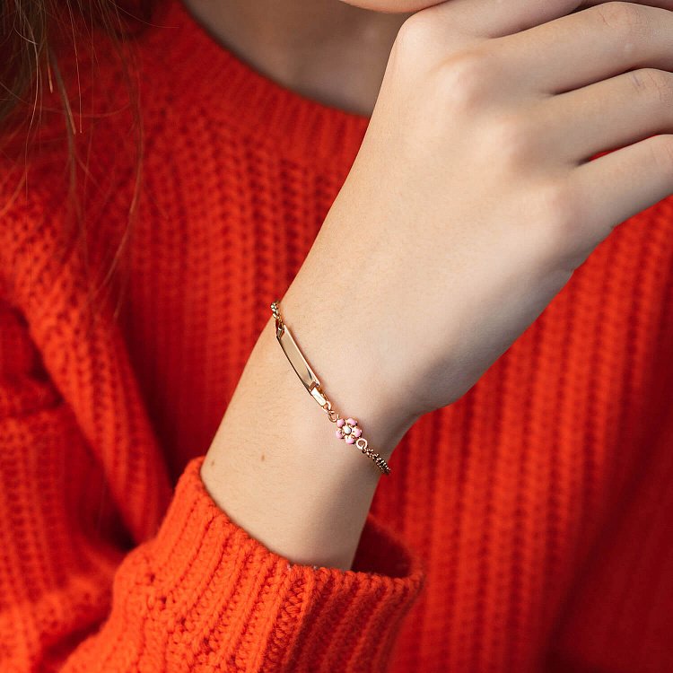 Золотий дитячий браслет "Квіточка і Сердечко" з емаллю б04579 від ювелірного магазину Онікс - 1