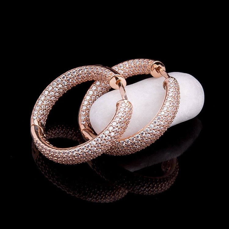 Золоті сережки "Кільця" з фіанітами с03792 від ювелірного магазину Онікс - 2