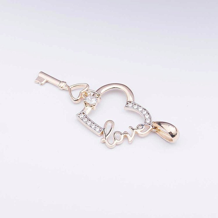 Золотая подвеска "Сердце и ключик" с фианитами п02445 от ювелирного магазина Оникс