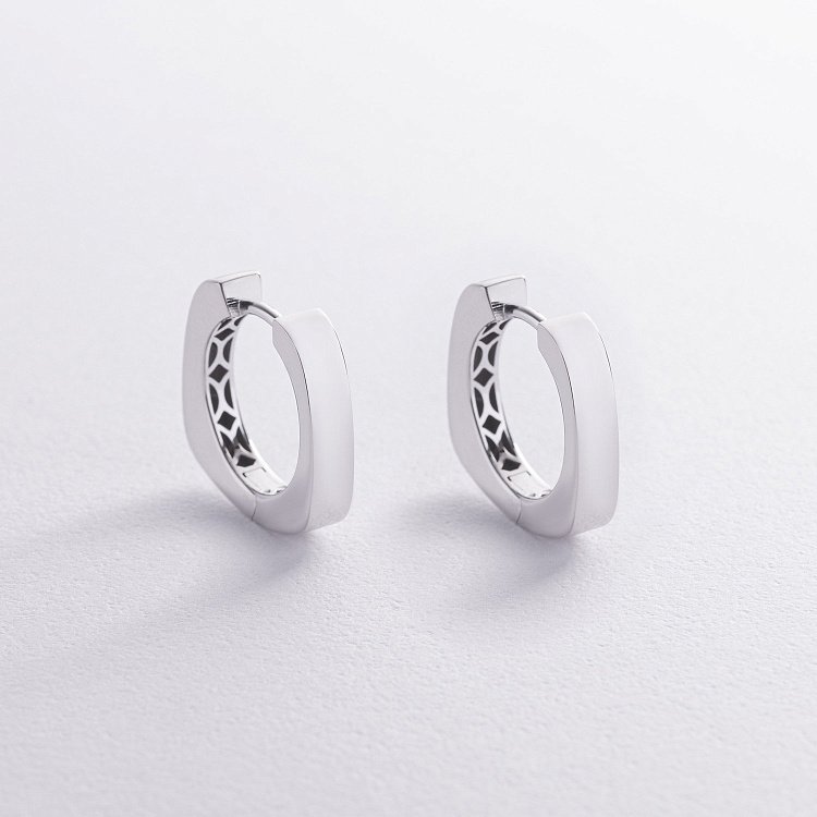 Серьги - кольца "Nora" в белом золоте с09019 от ювелирного магазина Оникс