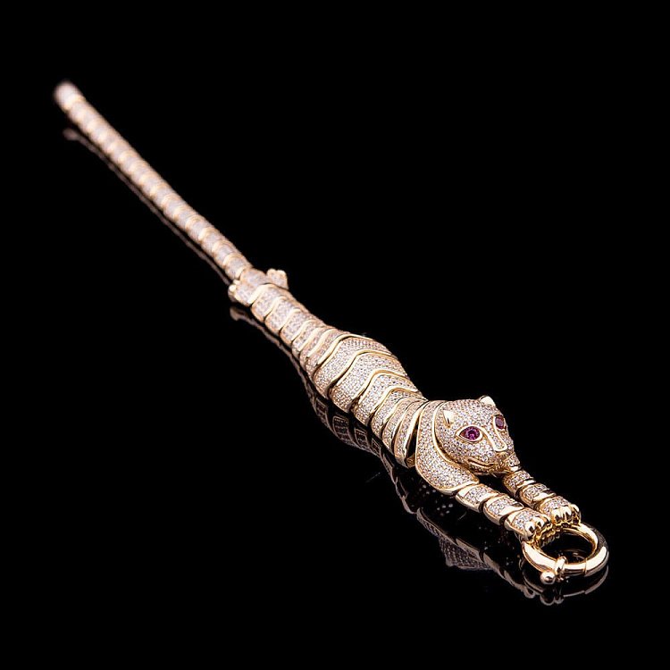 Ексклюзивний золотий браслет "Тигр" з фіанітами б01929 від ювелірного магазину Онікс