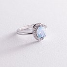 Серебряное кольцо с голубым топазом и фианитами 111479 от ювелирного магазина Оникс