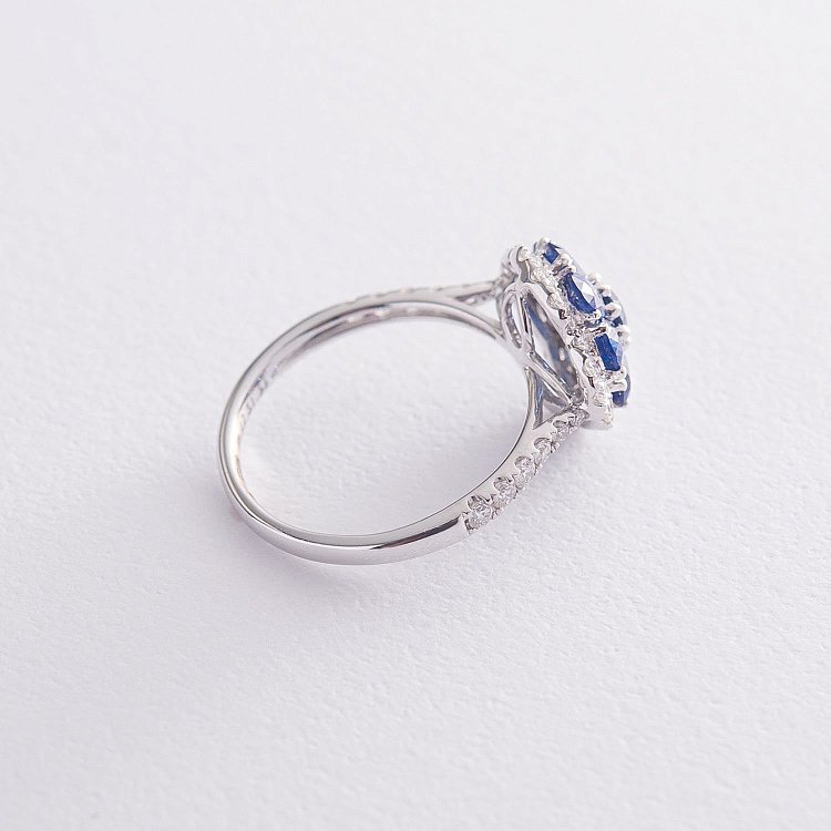 Золота каблучка з синіми сапфірами і діамантами R01757mi - 2 Золота каблучка з синіми сапфірами і діамантами R01757mi від ювелірного магазину Онікс - 2