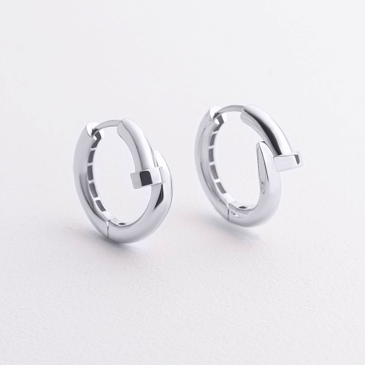 Сережки - кільця "Цвях" у білому золоті с09575 від ювелірного магазину Онікс