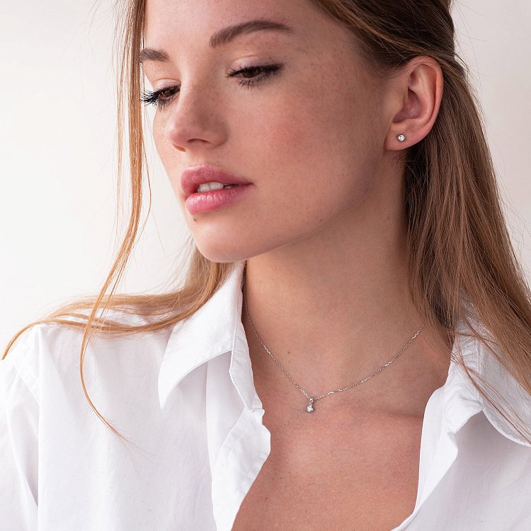 Золотые серьги - пусеты с бриллиантами сб0353y от ювелирного магазина Оникс - 1