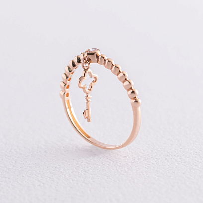 Золота каблучка "Ключик" з фіанітом к06800