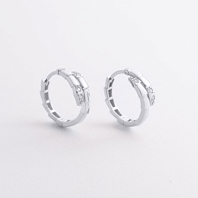 Серьги - кольца "Змеи" в белом золоте (фианиты) с09468