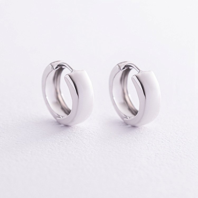 Сережки - кільця  в білому золоті с08199 Сережки - кільця  в білому золоті с08199 від ювелірного магазину Онікс