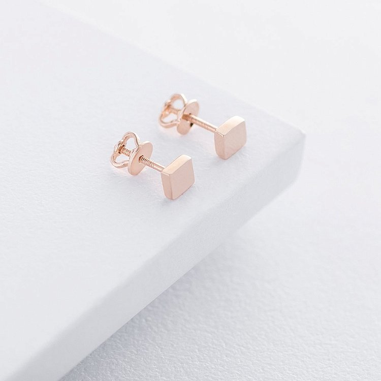 Золотые серьги-пусеты "Ромбы" с06053 от ювелирного магазина Оникс