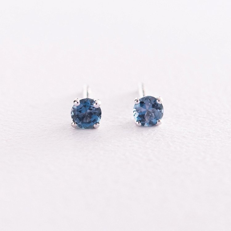 Золотые серьги - пусеты (топаз "Лондон голубой") сб0115gl от ювелирного магазина Оникс