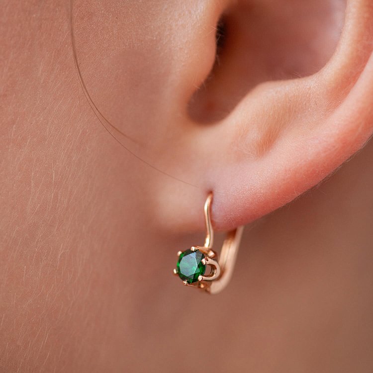 Дитячі золоті сережки з зеленими фіанітами с05762 від ювелірного магазину Онікс - 1