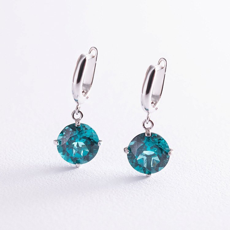 Золотые серьги "Влечение" с синтетическим кварцем с05293 от ювелирного магазина Оникс