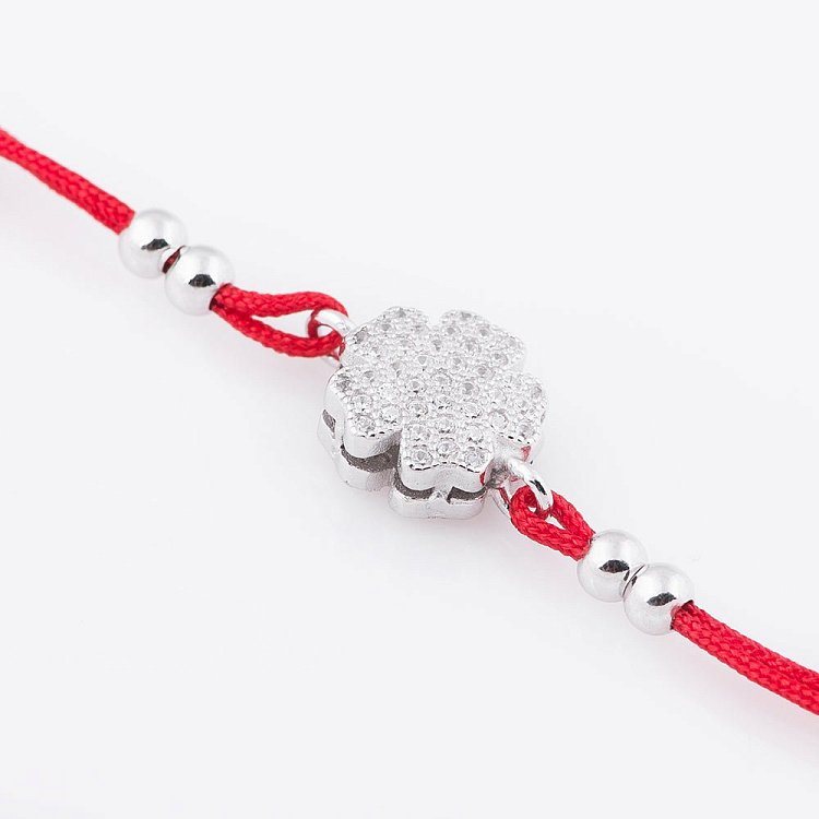 Браслет с красной нитью и цветочком 141156 от ювелирного магазина Оникс - 1