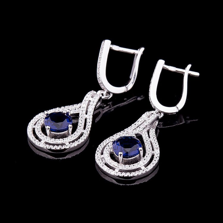 Сережки з синтетичної шпинелью синього кольору с018 від ювелірного магазину Онікс - 1