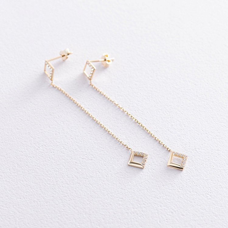 Золотые серьги "Ромбы" на цепочке (фианиты) с07233 от ювелирного магазина Оникс