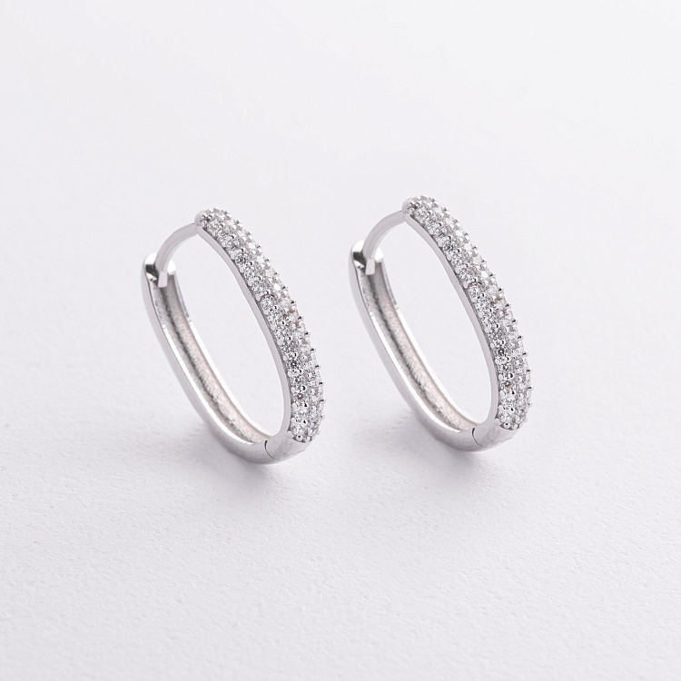 Золотые серьги "Овальные" с фианитами с09505 от ювелирного магазина Оникс