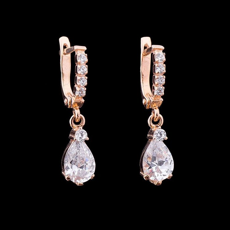 Золоті сережки "Крапельки" з фіанітами с01626 від ювелірного магазину Онікс