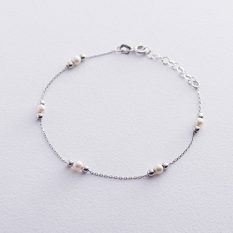 Золотий браслет з перлинами б04296 від ювелірного магазину Онікс