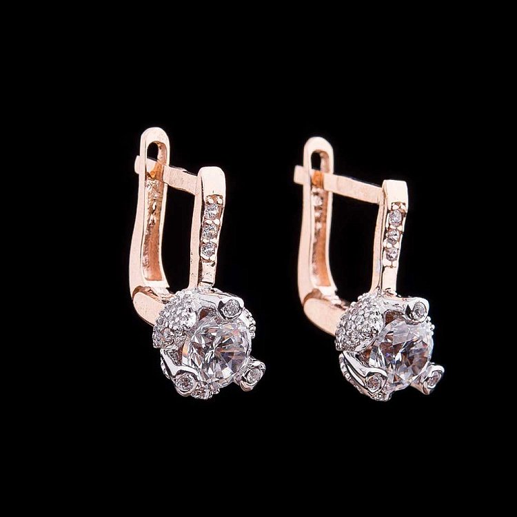 Золоті сережки з фіанітами с04127 від ювелірного магазину Онікс