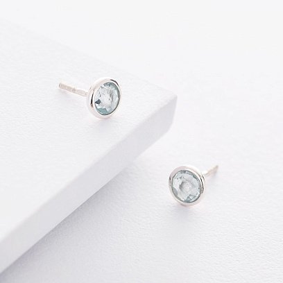 Срібні сережки - гвоздики з блакитним топазом 122173