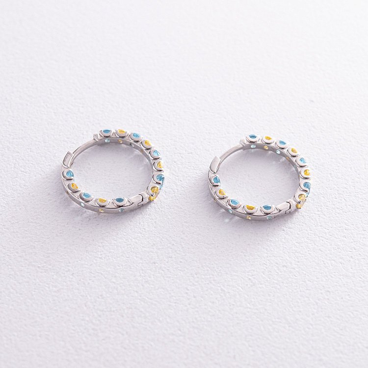 Срібні сережки - кільця з блакитними і жовтими фіанітами OR126610 від ювелірного магазину Онікс - 2