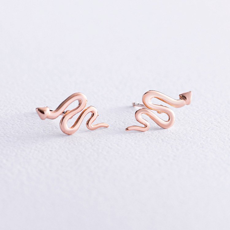 Серьги - пусеты "Змеи" в красном золоте с07880 от ювелирного магазина Оникс