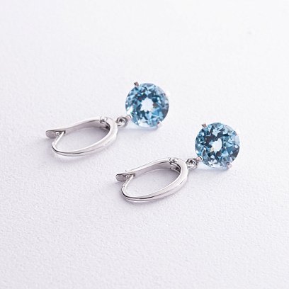 Золотые серьги "Влечение" с голубым топазом с08003 №5